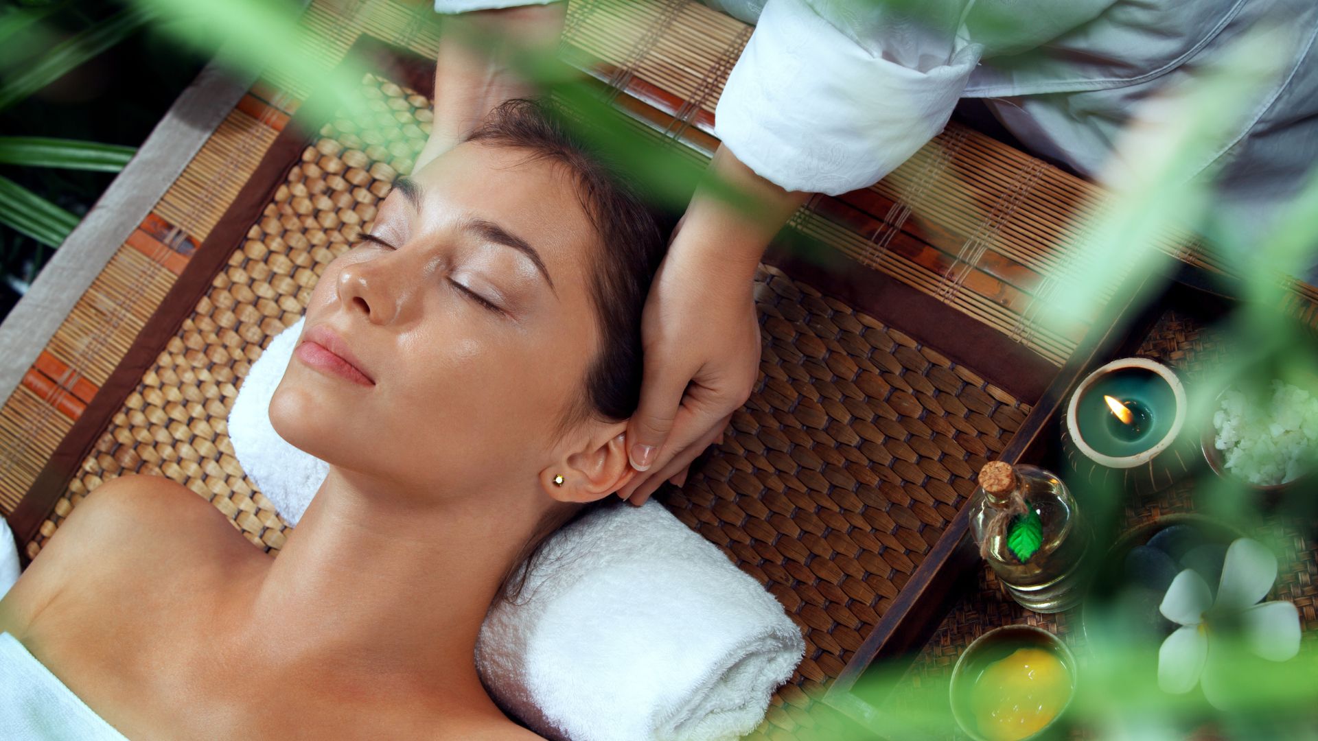 A woman getting a back massage at a spa